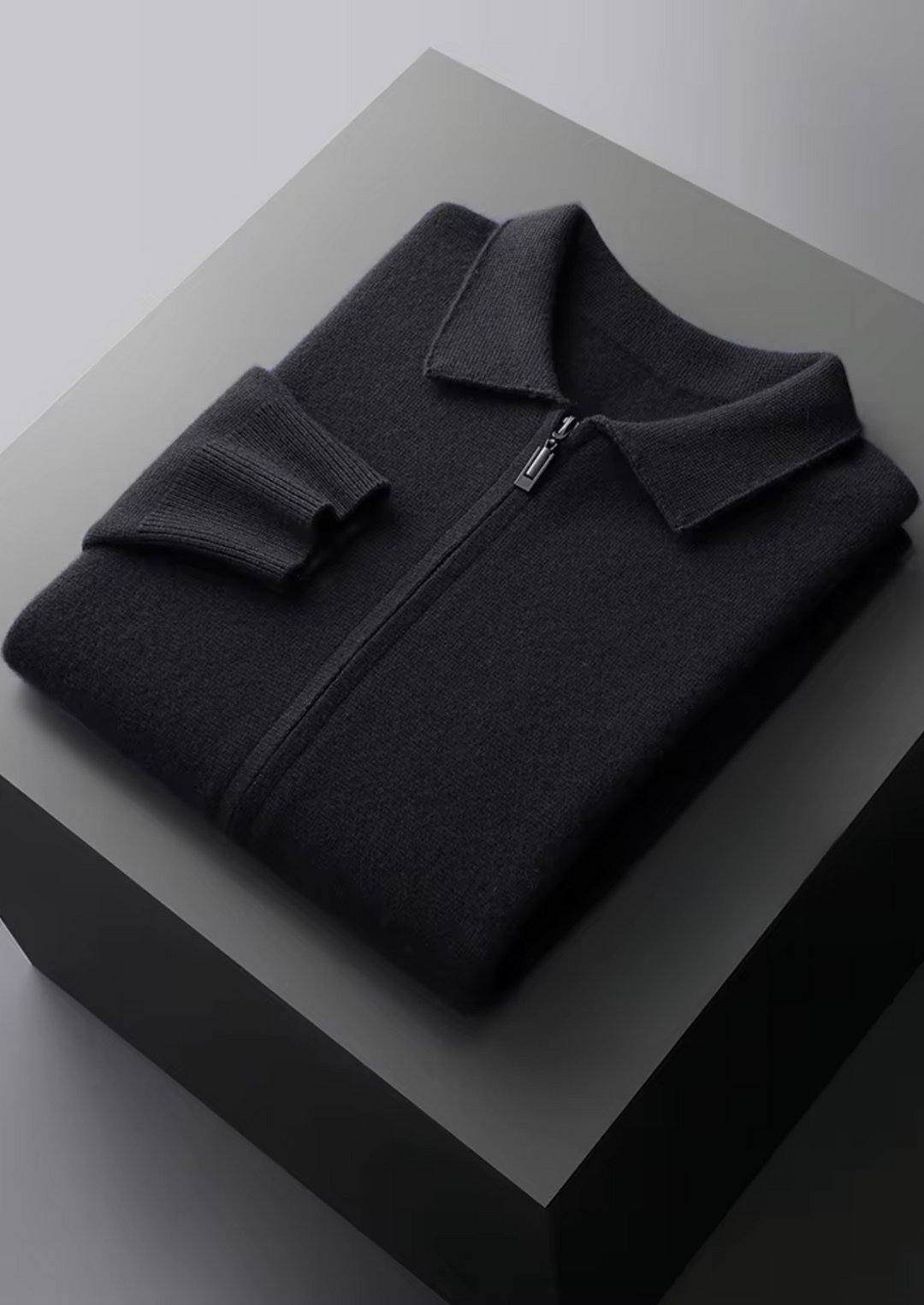 Intricate fabric weave of the men's collared zip-up cardigan sweater, ensuring warmth and durability.