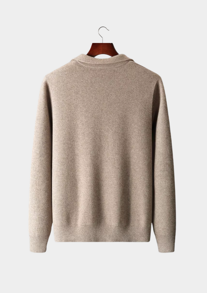 Textured knit of men's zip-up cardigan sweater, highlighting quality and all-season comfort.