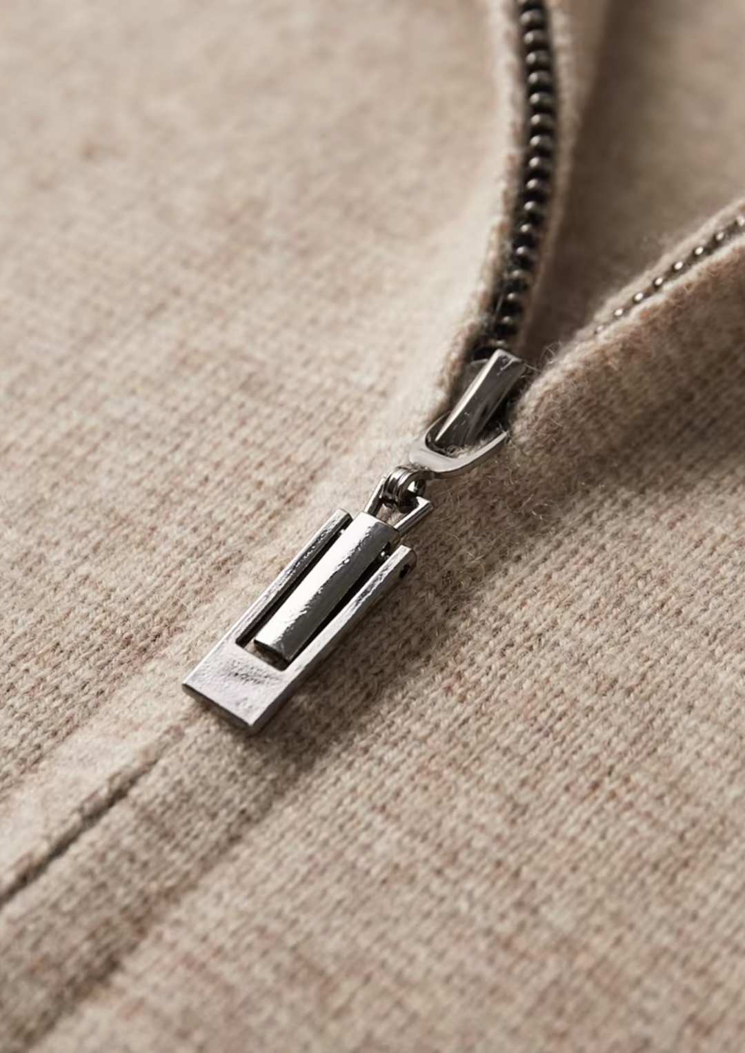 Rear view of a men's all-season zip-up cardigan sweater, showcasing its clean lines and design.