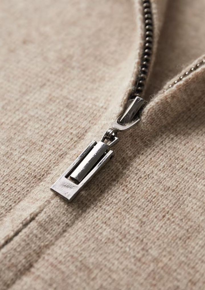 Rear view of a men's all-season zip-up cardigan sweater, showcasing its clean lines and design.