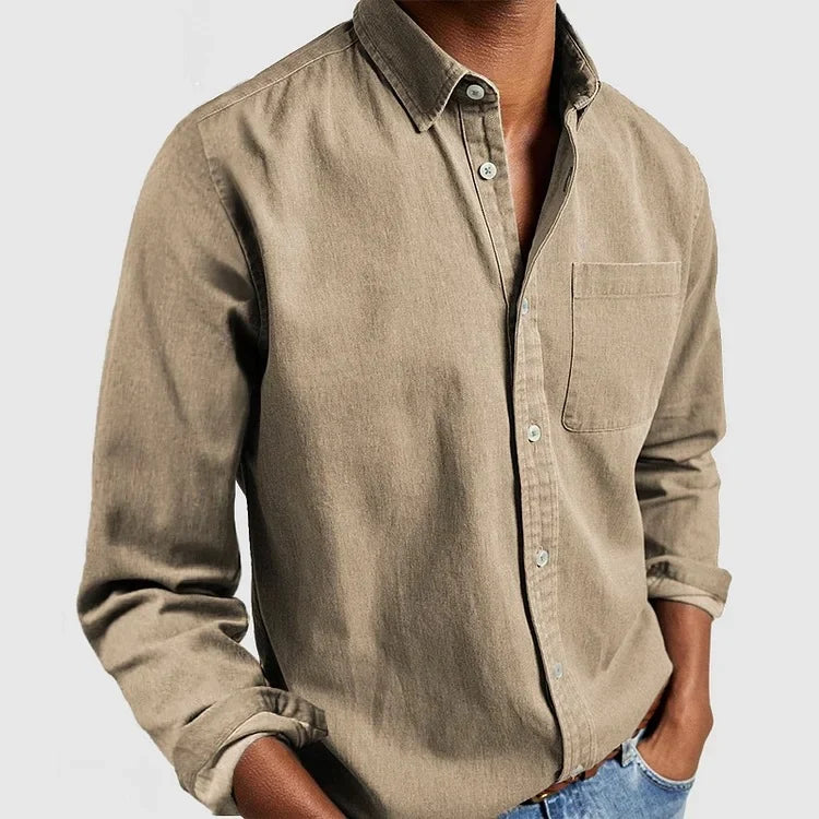Versatile men's long sleeve button-up shirt, relaxed fit, perfect for layering or travel outfits.
