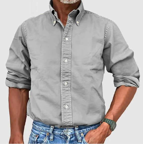 Men's vintage long sleeve button down shirt, relaxed fit. Easy to wear casual top, combining comfort with style.