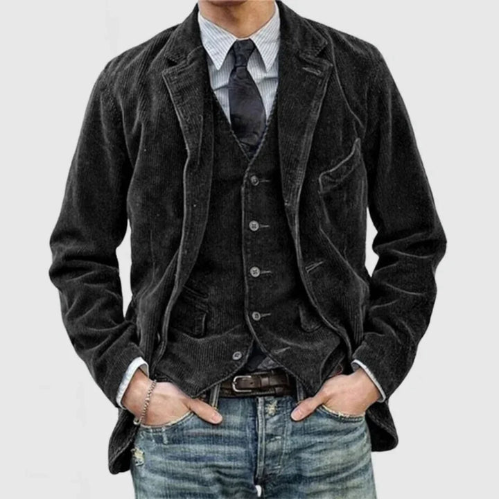 Blue vintage style tailored blazer & black vest set for men. Versatile formal wear or business casual men's fashion.
