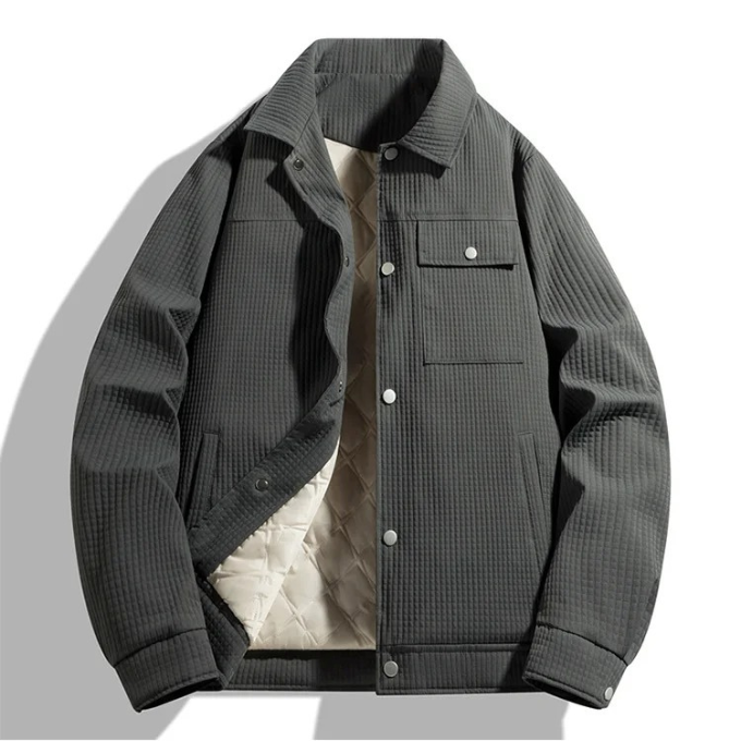 Stylish men's quilted jacket in a waffle knit pattern, perfect for fall fashion and warmth.