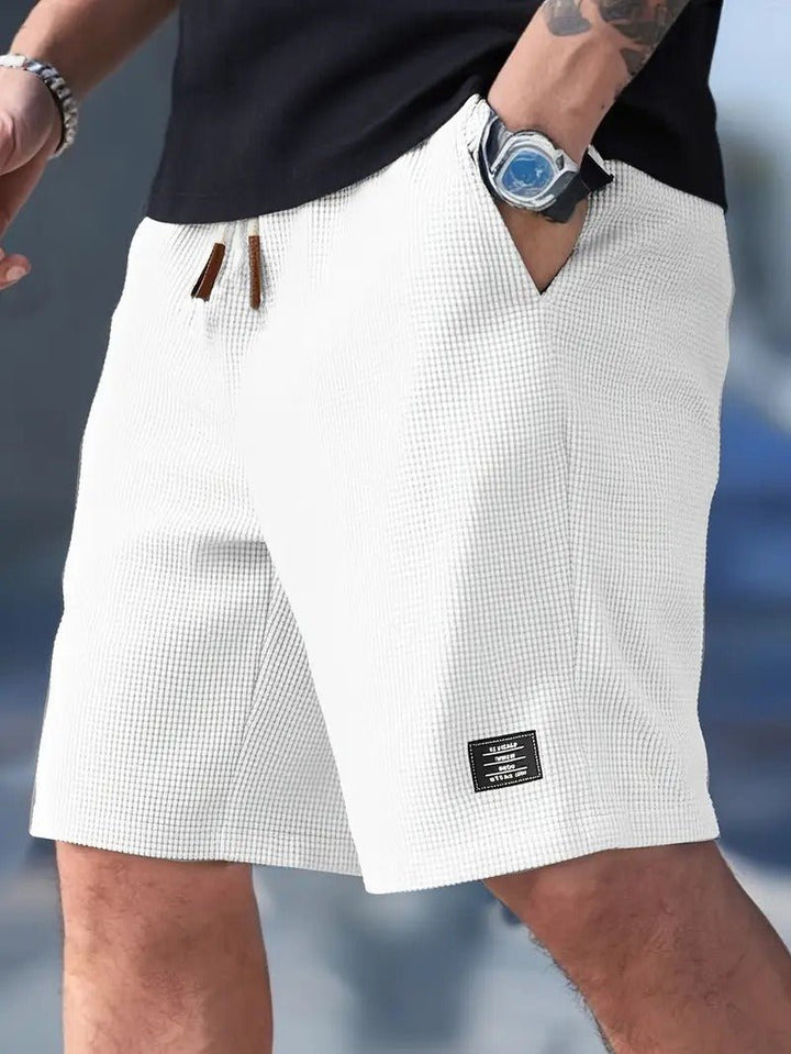 Versatile men's relaxed fit waffle shorts for any casual occasion, comfortable everyday wear, and summer fashion.