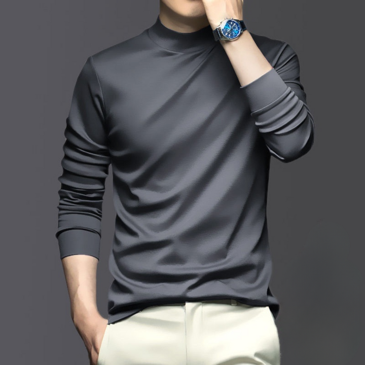 Warm, breathable & wrinkle-free men's long sleeve top. Comfortable polyester casual shirt for layering.