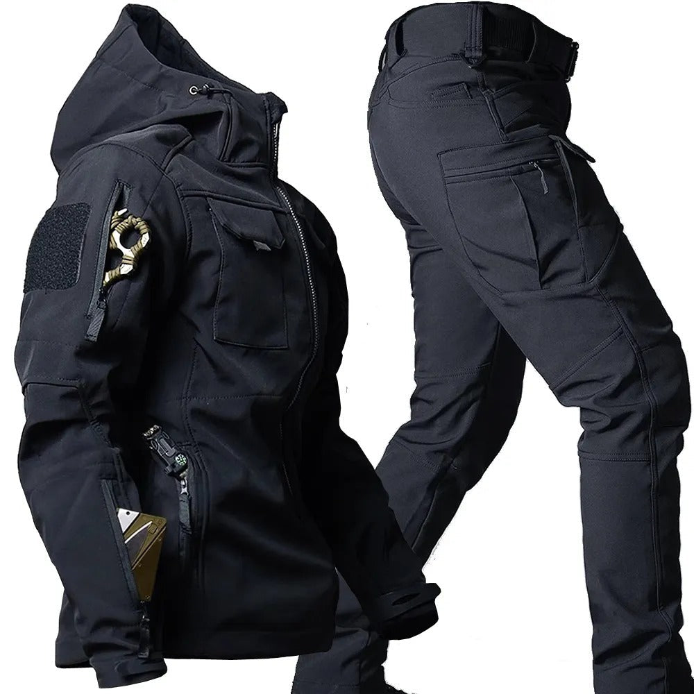 Black men's waterproof & windproof outdoor jacket and trousers set. Breathable gear for rain protection.