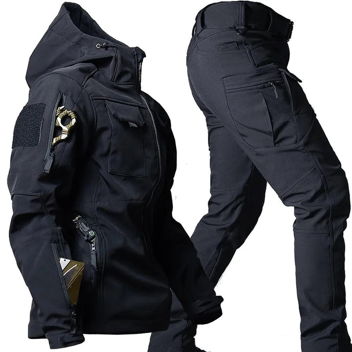 Black men's waterproof & windproof outdoor jacket and trousers set. Breathable gear for rain protection.