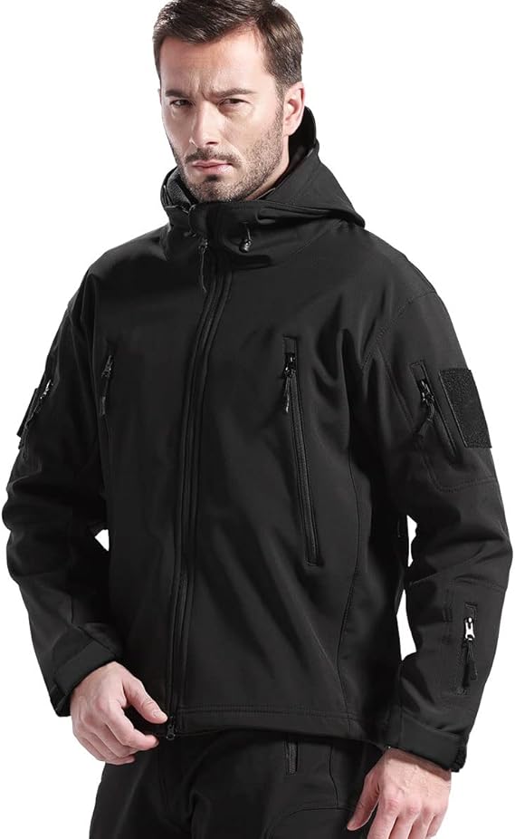 Men's waterproof outdoor jacket & tactical pants set for hiking adventures. Durable windproof gear.