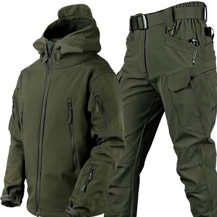 Rugged men's outdoor set featuring a waterproof jacket & durable tactical pants for exploration.