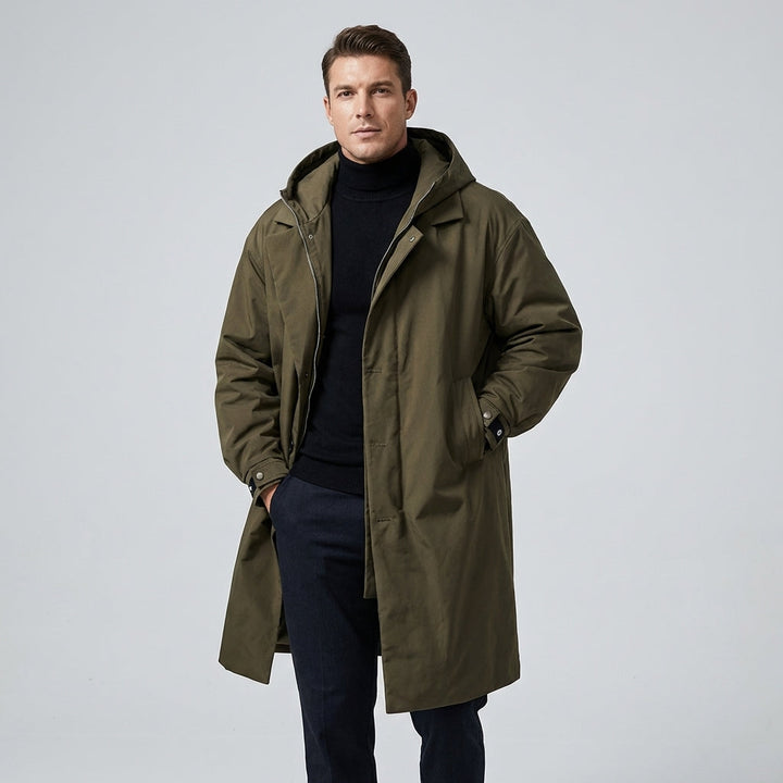 Men's waterproof raincoat with adjustable hood, lightweight design, & all-weather protection. Ideal for travel & daily use.