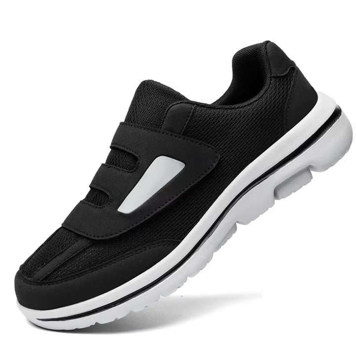 Men's black adjustable orthopedic slip-on shoes, wide fit with Velcro for superior comfort & foot support.