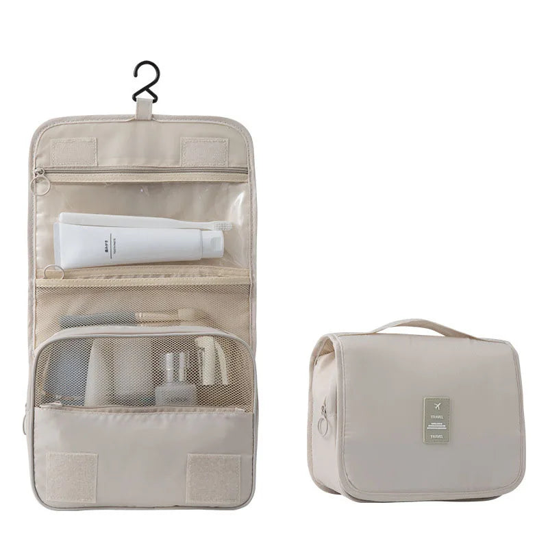 Foldable travel toiletry bag with 6 compartments, ideal for organizing men's & women's essentials.