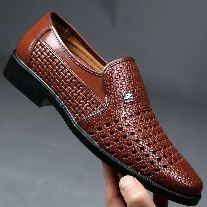 Detail of the woven pattern on men's leather slip-on shoes, a blend of classic and modern aesthetics.