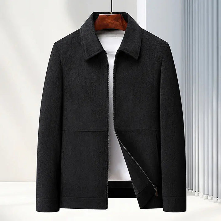 Detail of the zipper and collar on a men's woven textured jacket, great for mens fashion.