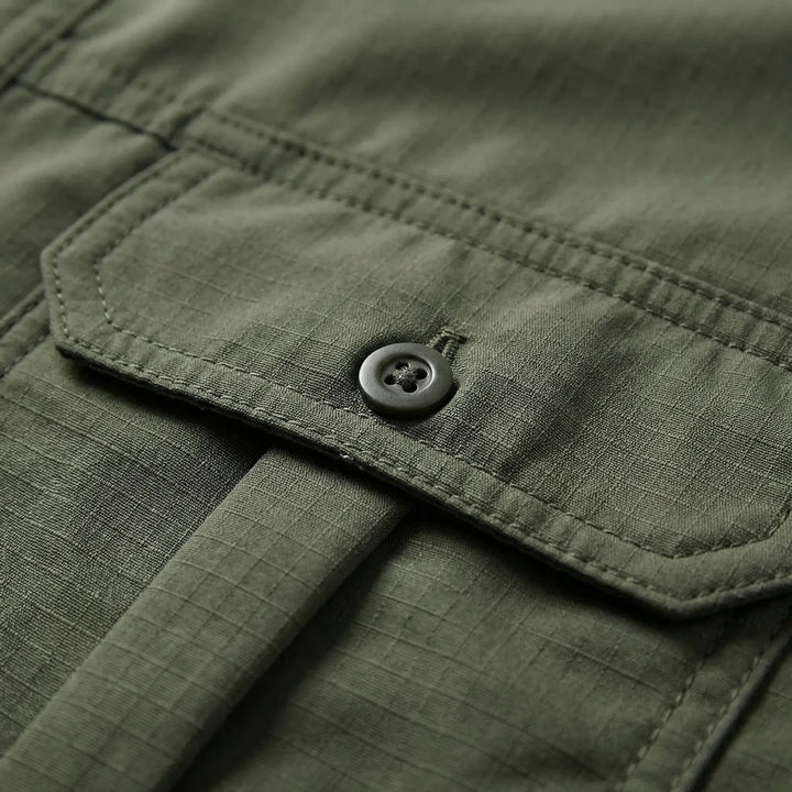 Adventure-ready men's outdoor shirt with UPF sun protection & quick-dry fabric for hiking, camping, and travel.