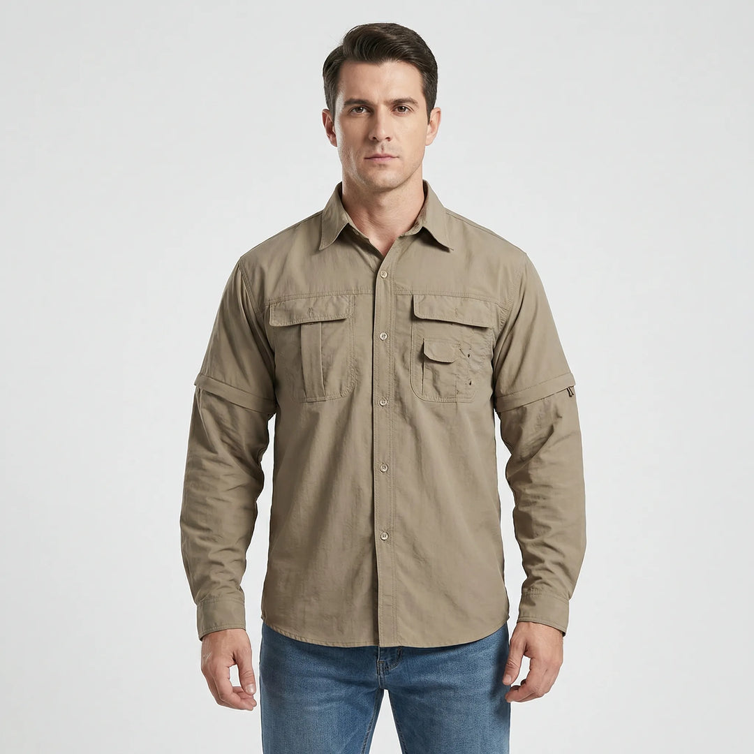 Close-up of zip-off sleeves on a men's outdoor shirt, highlighting convertible design for adaptable adventure wear.