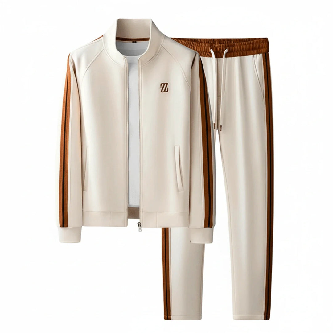 Men's athletic style tracksuit. Comfortable zip-up jacket & soft joggers, great for relaxation.