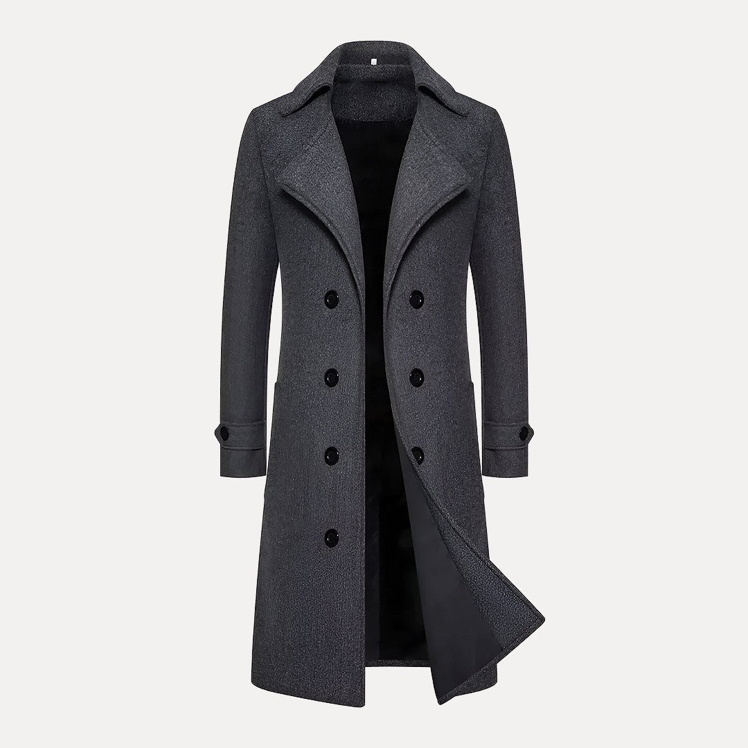 Formal men's double-breasted long coat with classic peak lapels. Elegant tailored overcoat, ideal for winter menswear.