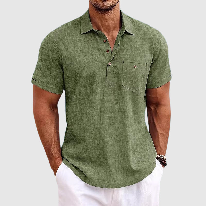 "Men's textured polo shirt with chest pocket, short sleeves, turn-down collar, and relaxed fit for warm-weather comfort."