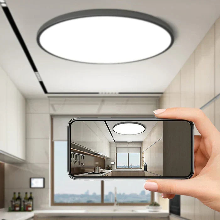 Sleek flat minimalist AuraSphere LED ceiling light fixture, perfect for modern home decor.