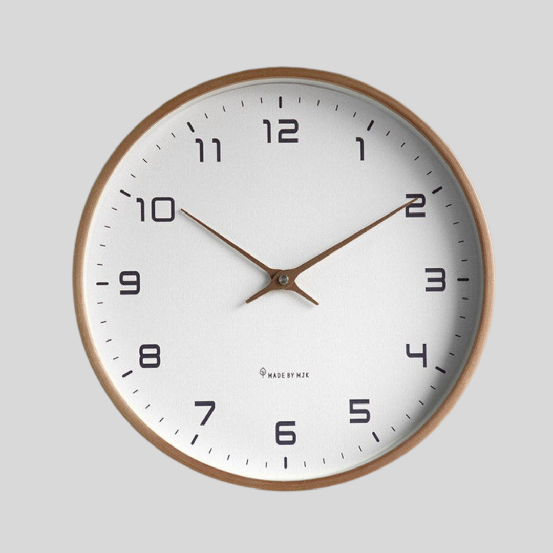 Minimalist wooden wall clock with silent quartz movement. Modern Scandinavian design, ideal for quiet home decor.