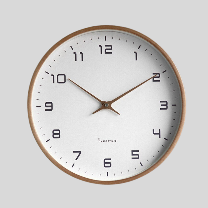 Minimalist wooden wall clock with silent quartz movement. Modern Scandinavian design, ideal for quiet home decor.