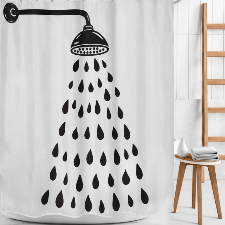 Decorative modern bathroom shower curtain with a unique black and white drop design. Enhances home decor.