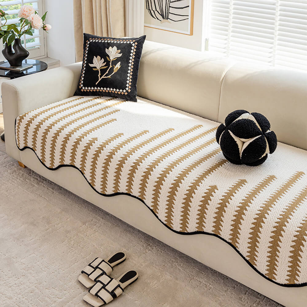 Pet-friendly, non-slip chevron sofa protector with modern wavy edges. Ideal couch cover for living room.