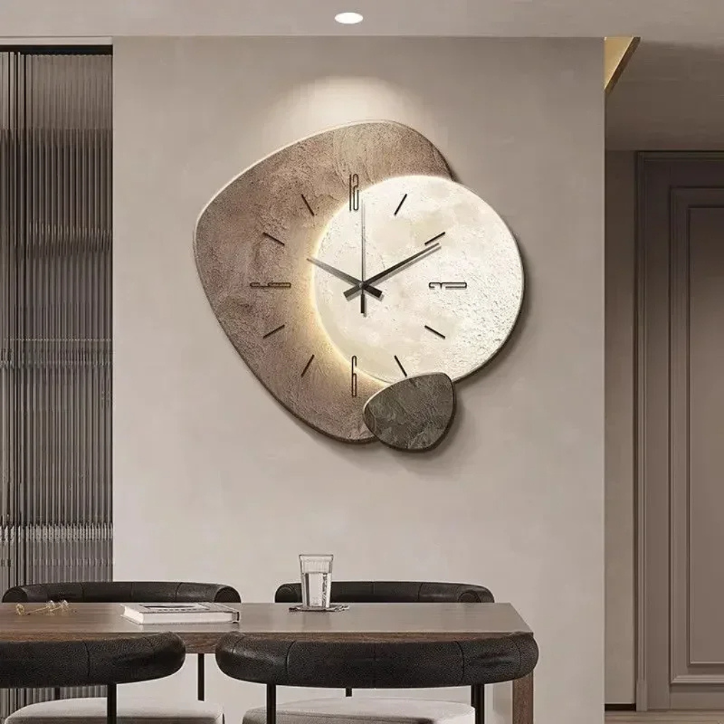 Dimmable LED wall clock, casting ambient light for enhanced living room or office ambiance.
