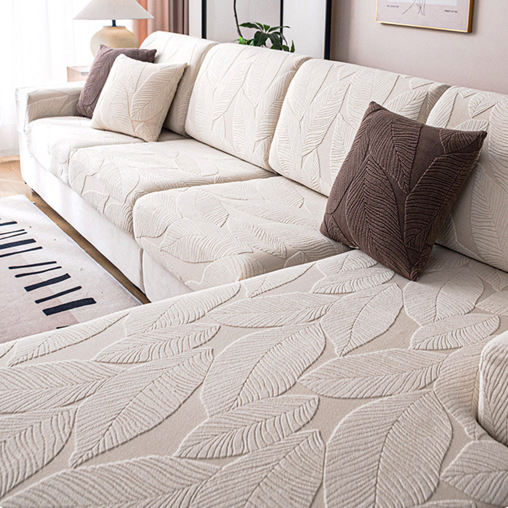 Elegant modern leaf jacquard sofa cover. Stretch fit, waterproof, anti-scratch, ideal for pets & home decor.