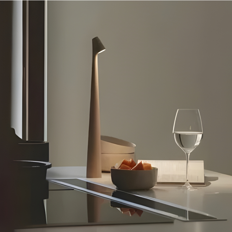 Dimmable cordless LED table lamp creating flexible mood lighting for any room, desk, or patio.