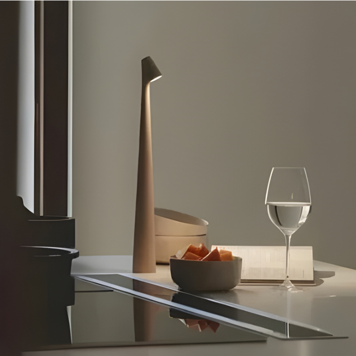 Dimmable cordless LED table lamp creating flexible mood lighting for any room, desk, or patio.