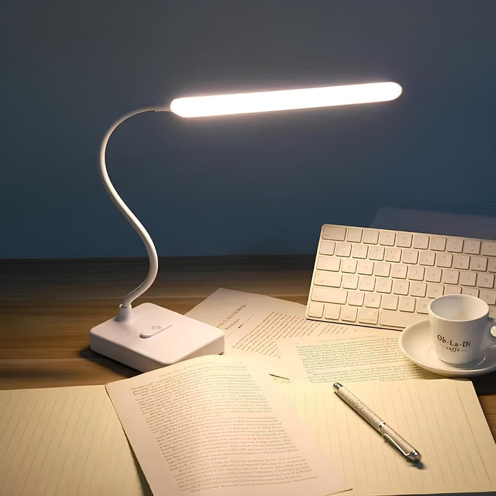 Versatile dimmable LED task light, LumoFlex flexible desk lamp, ideal for home office or student desk.
