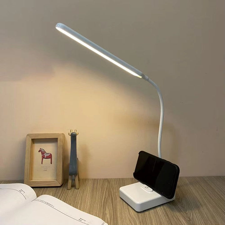 Sleek LumoFlex LED desk lamp, a flexible task light perfect for modern home office lighting and reading.