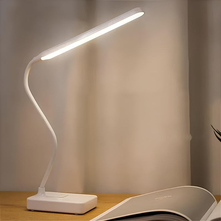 Flexible LumoFlex LED lamp offering adjustable, dimmable light for office desks, reading, or task work.