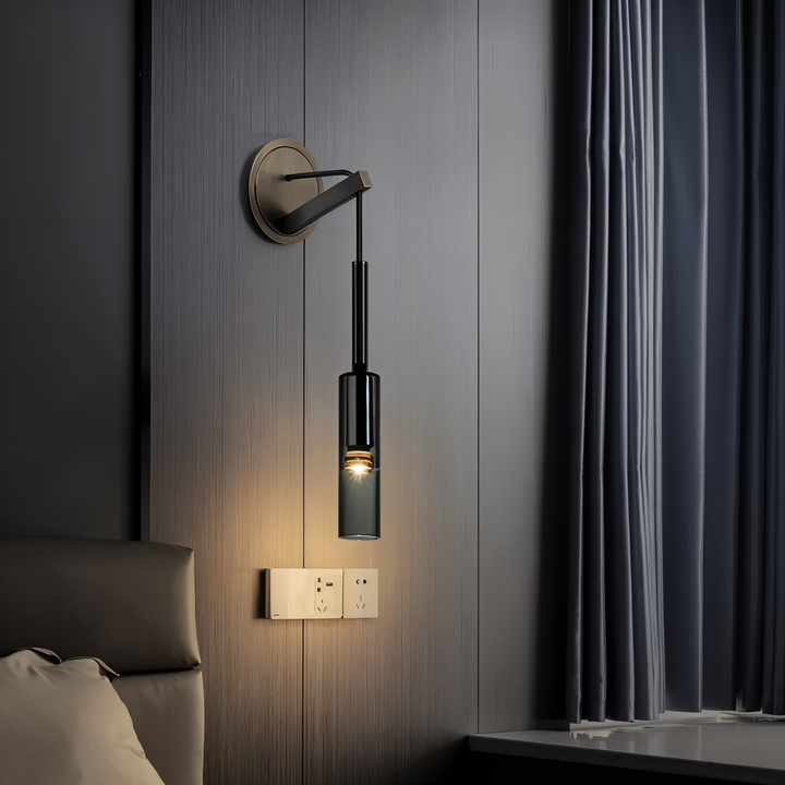 Orvane wall lamp: striking smoke glass, minimalist aesthetic, adds modern flair to your space.