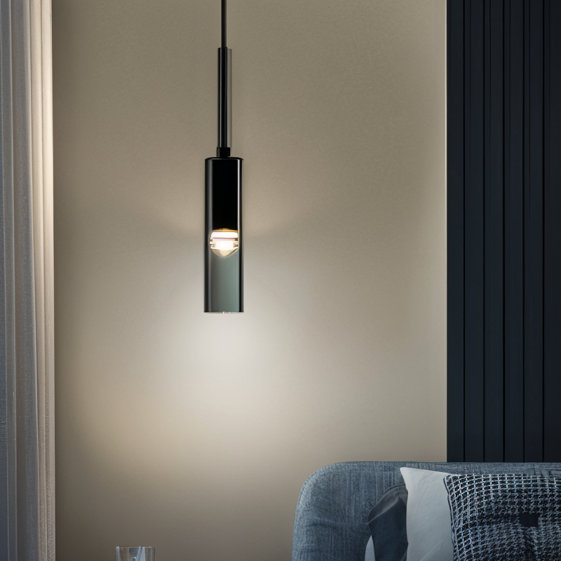 Sleek LED wall light Orvane featuring a stylish smoke glass accent. Ideal for modern interior design.