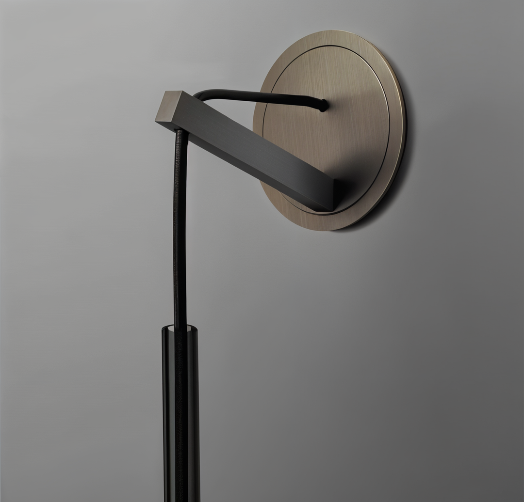 Orvane minimalist wall lamp: clean design, smoke glass globe, provides sophisticated accent lighting.