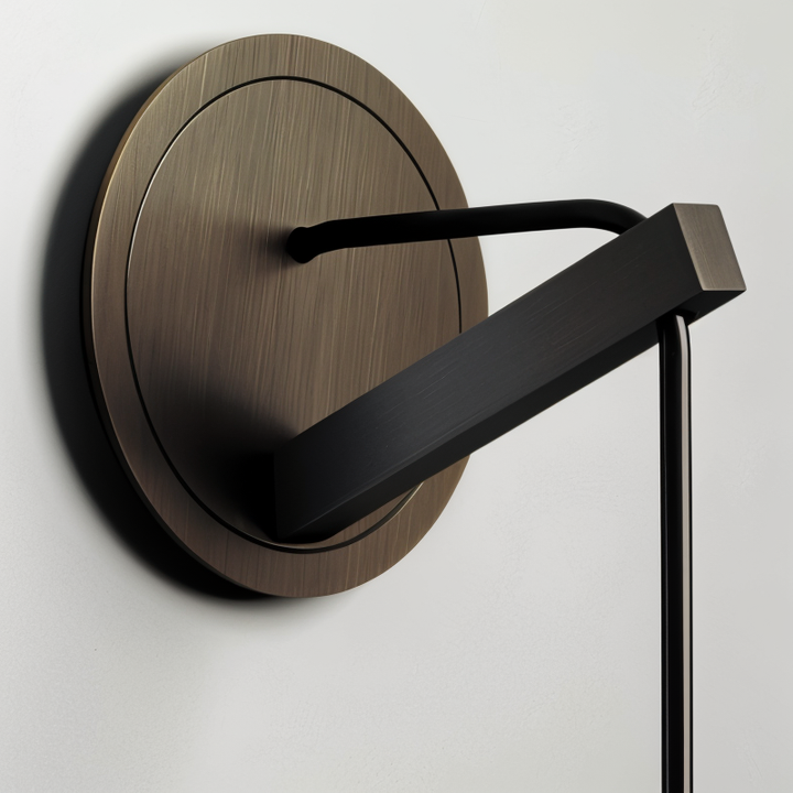 Decorative minimalist wall lamp Orvane with beautiful smoke glass detail. Enhances any home decor.