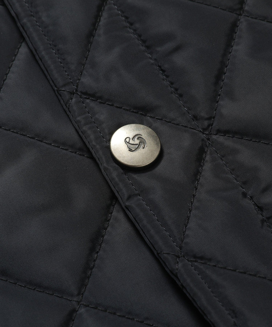 Modern women's quilted vest in white, pristine and chic, great for transitional weather.