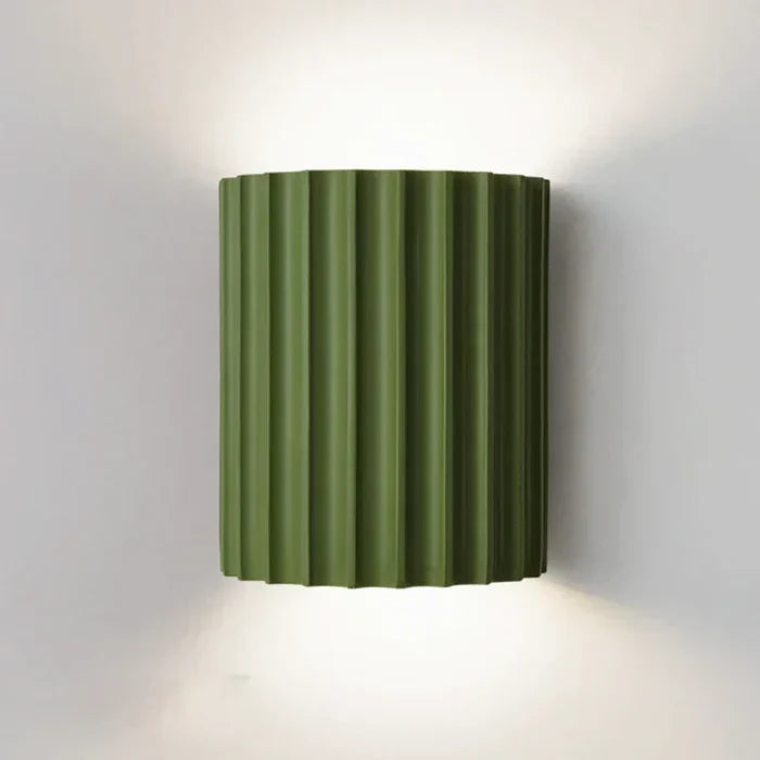 Modern wall lamp, crafted from resin, offering stylish and unique ambient LED light. Great for home decor.