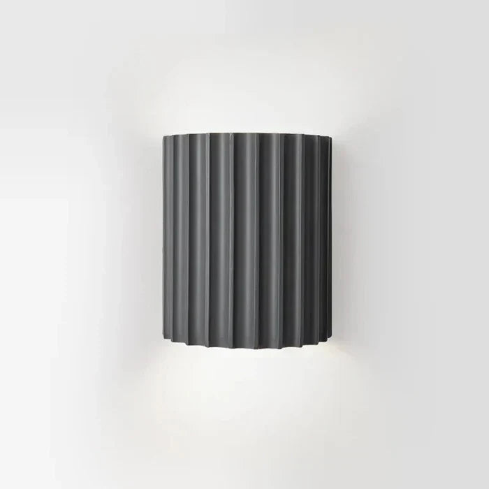 Unique modern resin wall lamp, perfect accent lighting for contemporary homes. Decorative LED light fixture.