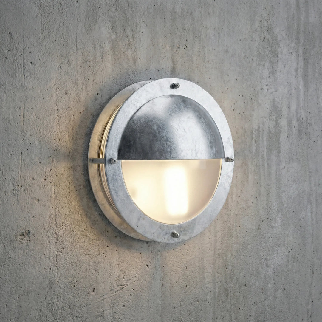 Dimmable round Marinova outdoor wall light, galvanized steel, perfect for patio & porch exterior.