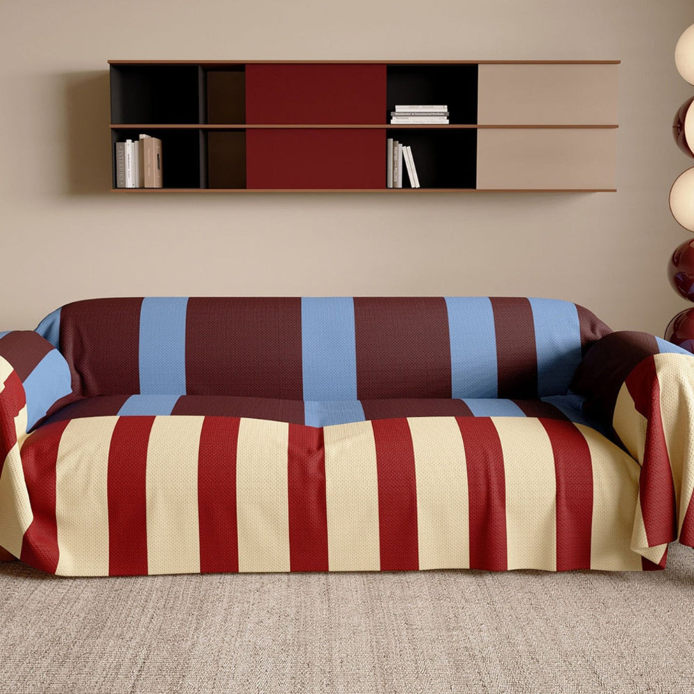 Modern striped sofa cover, geometric design for stylish living room decor. Furniture protector, easy clean.