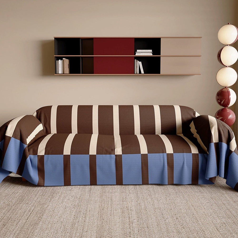 Easy-clean striped sofa cover, modern geometric design for a stylish home refresh. Furniture protection.