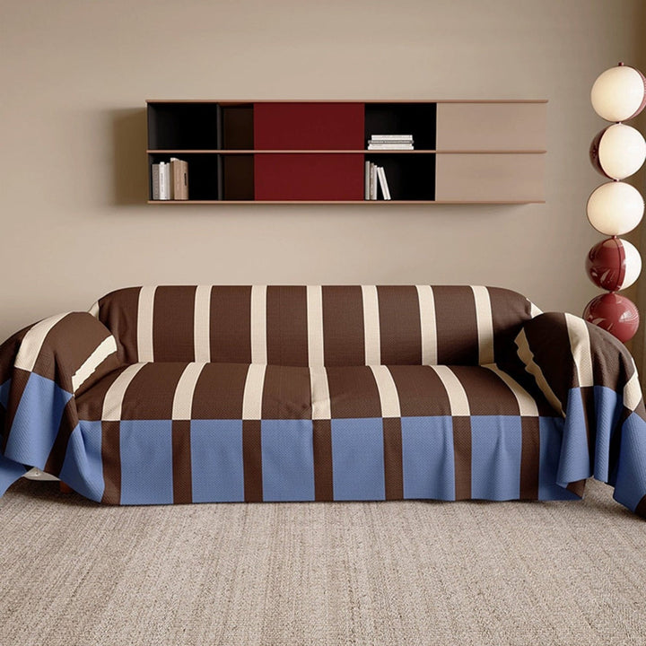Easy-clean striped sofa cover, modern geometric design for a stylish home refresh. Furniture protection.