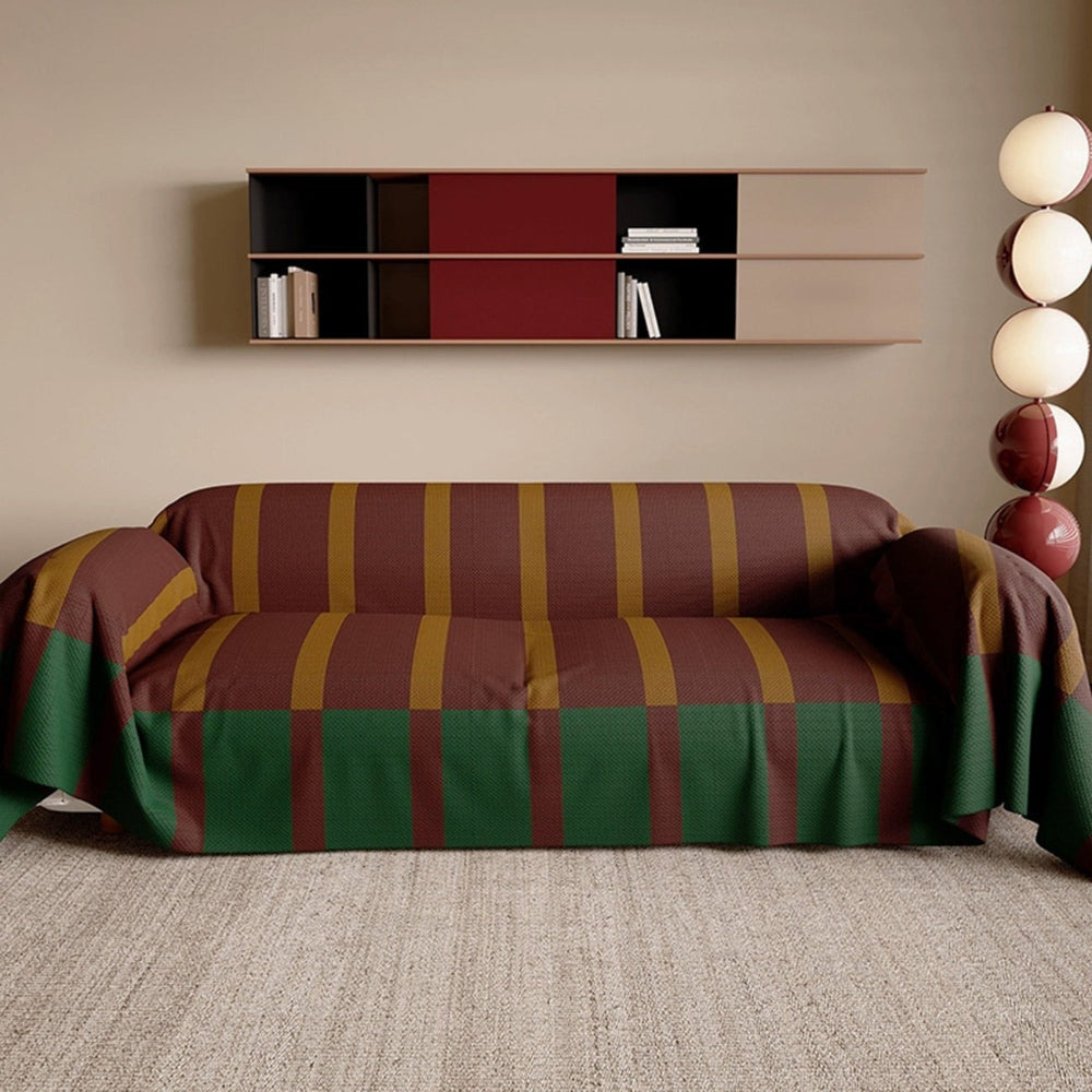 Stylish modern striped sofa cover with geometric design. Comfortable, durable furniture protector for living room.