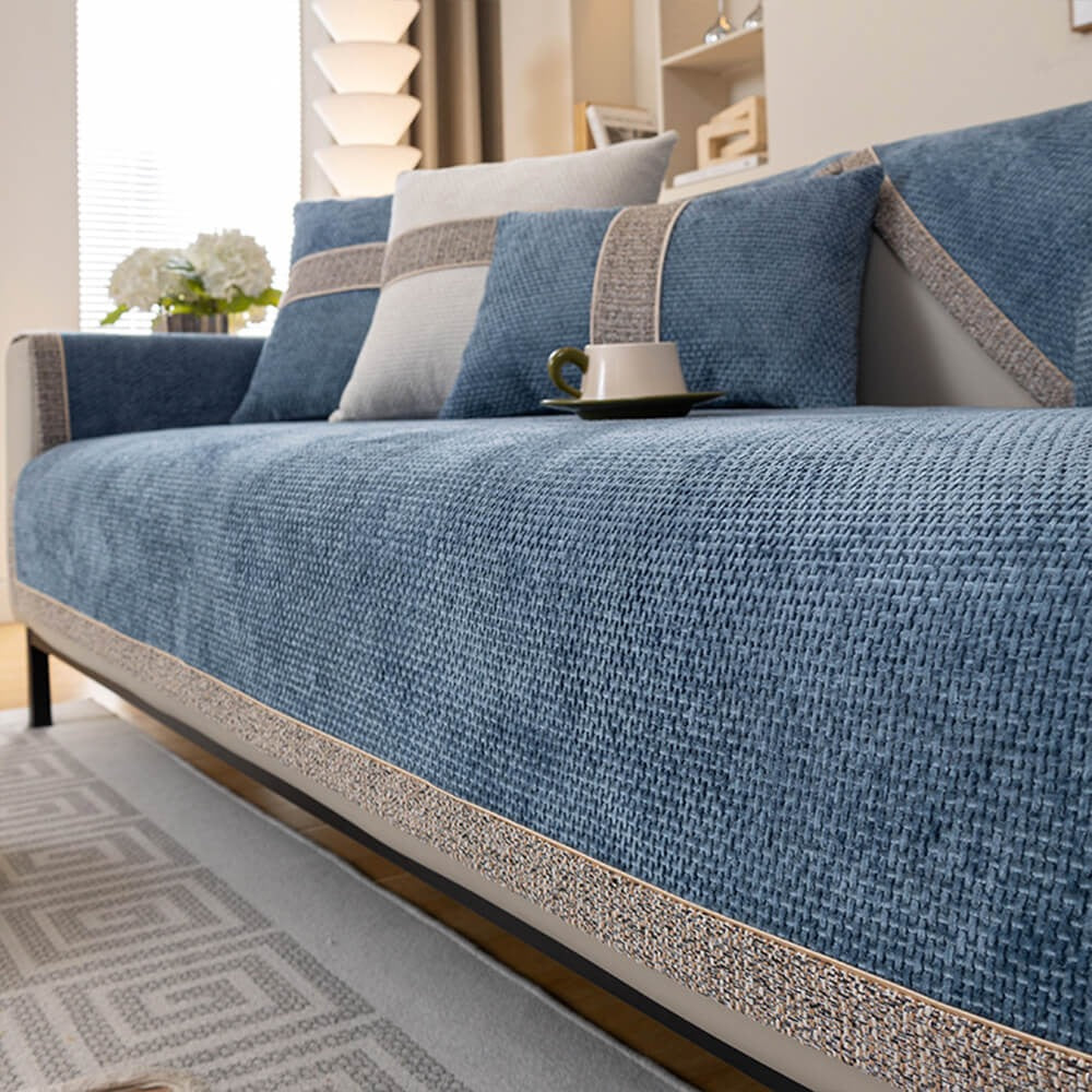 Practical tweed anti-slip sofa cover. Machine washable, pet-friendly furniture protector for easy living room care.