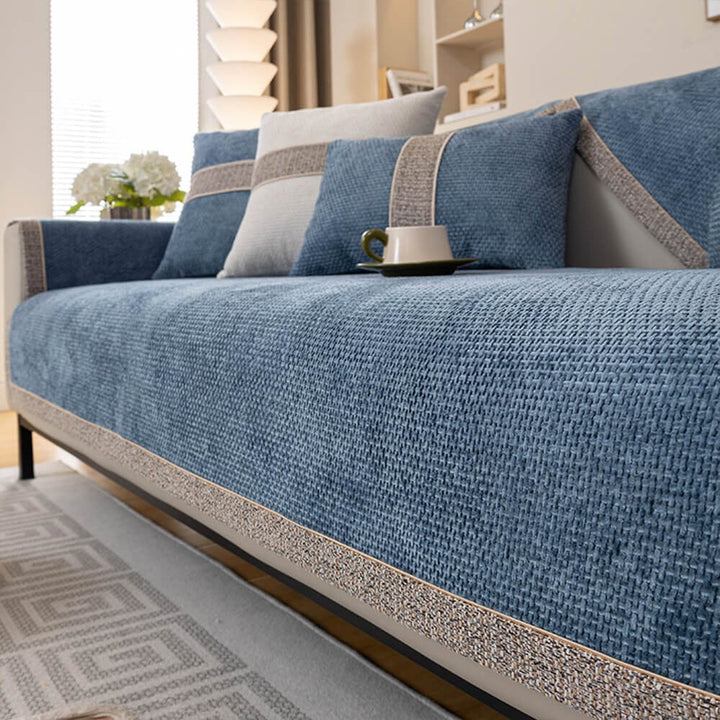 Practical tweed anti-slip sofa cover. Machine washable, pet-friendly furniture protector for easy living room care.
